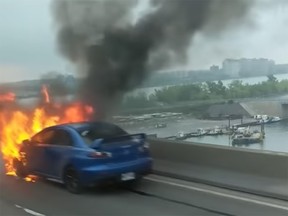 Southbound traffic on the Champlain Bridge has resumed moving after being stopped for about 20 minutes by a car fire that broke out just before the superstructure on the span at about 7:30 a.m.
