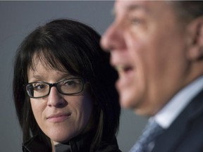 Justice Minister Sonia Lebel, here with Premier François Legault, is promising to reform family law.