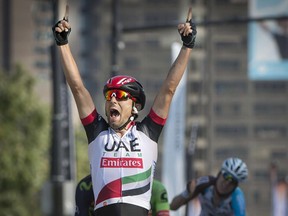 Diego Ulissi of UAE Team Emirates celebrates his victory at the finish line of the 2017 edition of Grand Prix Cycliste de Montreal.