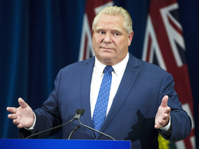 Ontario Premier Doug Ford holds a press conference arguing against a judge's ruling about slashing the size of Toronto City Council, Sept. 10, 2018.