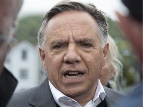 Coalition Avenir Québec Leader François Legault responds to reporters' questions in Tadoussac, Wednesday, Sept. 26, 2018.