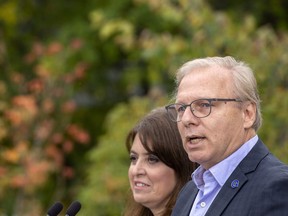 "We are the party of togetherness and we've been that way since the day of René Lévesque," says Parti Québécois Leader Jean-François Lisée, pictured with PQ candidate Véronique Hivon.