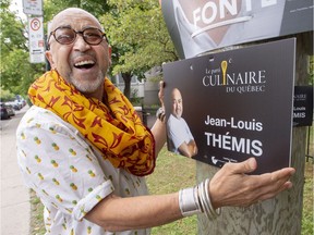 Jean-Louis Themis, leader and only candidate for the Culinary Party of Quebec, is seen with one of his campaign posters Wednesday, September 19, 2018 in Montreal, Que.. Themis is one of many fringe parties vying for seats in the upcoming provincial election.