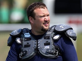 "No way could this have been done without being a part of great teams, without great teammates and coaches,” former Alouettes lineman Scott Flory, at practice in 2010, says of his enshrinement in the Canadian Football Hall of Fame.