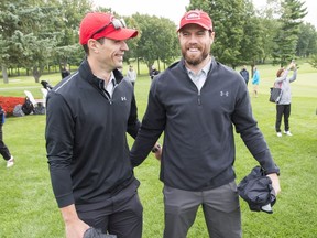 Canadiens goaltender Carey Price, looking for a bounce-back season in 2018-19, and defenceman Shea Weber, who will be sidelined until at least December, get reacquainted before the team's charity golf tournament on Sept. 10, 2018, in Laval.