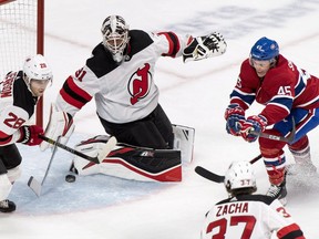 Canadiens forward Hunter Shinkaruk battles for loose puck in front of the New Jersey Devils net during NHL exhibition game at the Bell Centre on Sept. 17, 2018.