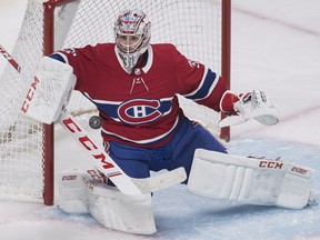 Canadiens goaltender Carey Price makes a save against the Ottawa Senators during second period NHL pre-season hockey action in Montreal on Saturday, Sept. 22, 2018.