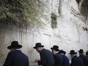 Ultra-orthodox jews pray at the Western Wall in Jerusalem. In 2017, anti-Semitic incidents against Canadian Jews were the highest since B’nai Brith Canada began tracking them 35 years ago, Lise Ravary writes.