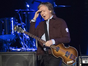 Paul McCartney looks at the crowd as he performs at the Freshen Up world premiere show, Monday, September 17, 2018 in Quebec City.