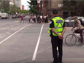 Montreal police set up a road safety operation in downtown Montreal on Wednesday, Sept.12, 2018.