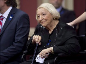 Former Parti Québécois cabinet minister Lise Payette smiles as she enters a ceremony to receive the Prix du Québec award at the National Assembly in Quebec City in 2014.