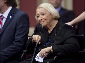 Former Parti Québécois cabinet minister Lise Payette, smiles as she enters a ceremony to receive the Prix du Québec award at the National Assembly in Quebec City in 2014. Lise Payette, a popular Quebec feminist, author, journalist, politician and television personality, died Wednesday, Sept. 5, 2018. Her family announced the death in a press release, saying she was surrounded by family and friends at home. Payette was 87.