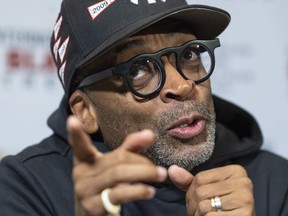 American film director Spike Lee responds to a question during a news conference in Montreal on Wednesday, September 26, 2018.