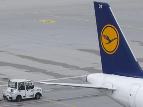 A Lufthansa plane is parked at the airport in Munich, Germany, Wednesday, April 27, 2016.