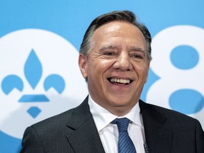 Coalition Avenir Quebec leader Francois Legault smiles during a news conference in Laval, Que. on Tuesday, September 11, 2018. "Legault continues to appeal to Quebec’s collective and wholly understandable fear of the decline of French, then pins this supposed decline on immigrants to Quebec. Why? Because it’s easy, and it works," Martin Patriquin writes.