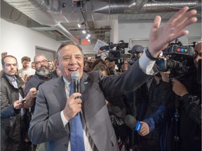 Coalition Avenir Québec Leader Francois Legault greets candidates and supporters while campaigning Friday, September 21, 2018 in Montreal.