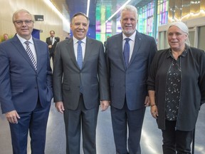 PQ leader Jean-Francois Lisee, left to right, CAQ leader Francois Legault, Liberal leader Philippe Couillard and Quebec Solidaire spokesperson Manon Masse stop for a photo before entering the Congress of Quebec Municipalities Thursday, September 20, 2018 in Montreal, Que.