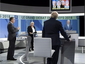 CAQ Leader François Legault, left, Quebec solidaire Leader Manon Massé, PQ Leader Jean-François Lisée and Liberal Leader Philippe Couillard take part in the leaders' debate Thursday night.