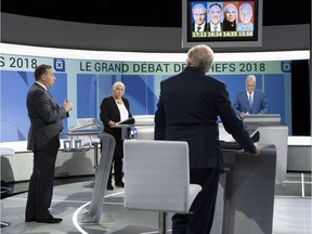 CAQ Leader François Legault, left, Quebec Solidaire leader Manon Massé, PQ leader Jean-François Lisée and Liberal leader Philippe Couillard take part in the first leaders debate Thursday, September 13, 2018 in Montreal.