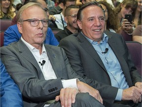 Parti Québécois leader Jean-François Lisée and CAQ leader François Legault participate in a youth-oriented event in Montreal, Friday, August 17 2018.