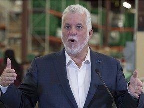 Quebec Liberal Leader Philippe Couillard speaks at his daily news conference, Sunday, September 16, 2018 in Quebec City.