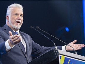 Liberal Leader Philippe Couillard speaks to the Federation of Quebec Municipalities Sept. 20, 2018 in Montreal.