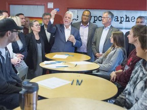 Quebec Liberal Leader Philippe Couillard is seen on the election campaign trail at College Montmorency in Laval on Tuesday, Sept. 11, 2018.