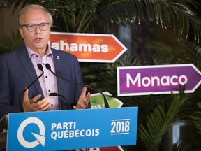 Parti Québécois Leader Jean-François Lisée speaks to reporters during a campaign stop in Montreal on Tuesday, Sept. 11, 2018.