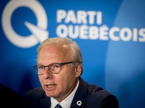 Parti Quebecois leader Jean-Francois Lisee speaks at a press conference in Montreal on Thursday, September 13, 2018.