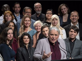 Quebec Solidaire co-spokesperson Manon Masse with local candidates during a campaign stop in Montreal, Sept. 26, 2018.