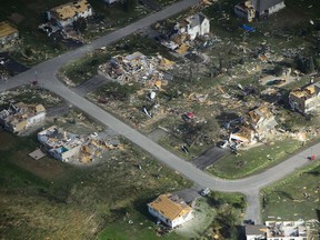 Damage from a tornado is seen in Dunrobin, Ont., west of Ottawa on Saturday, Sept. 22, 2018. The storm tore roofs off of homes, overturned cars and felled power lines in the Ottawa community of Dunrobin and in Gatineau, Que.