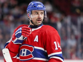 Montreal Canadiens' Tomas Plekanec watches teammates line up for faceoff against the New York Islanders in Montreal on Jan. 15, 2018.
