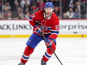 Montreal Canadiens Karl Alzner handles the puck during first period of National Hockey League game against the New York Islanders in Montreal Monday January 15, 2018.
