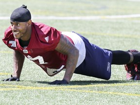 Defensive back Joe Burnett does pushups during the first day of Montreal Alouettes training camp in spring 2018.