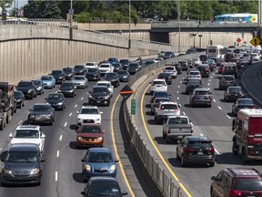 Traffic in the Décarie Expressway trench in Montreal, on Thursday, July 5, 2018: "There are more than 4.7 million personal cars and light trucks on Quebec roads today, an increase of over 35 per cent since 2001," Martin Patriquin writes.