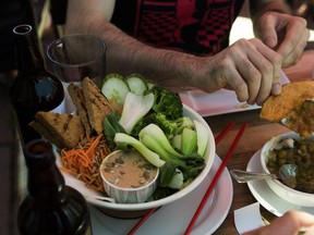 Diners eat at vegan restaurant Aux Vivres in the Westmount area of Montreal, on Thursday, July 19, 2018.