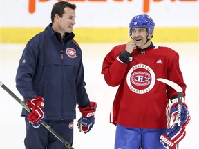 Montreal Canadiens' Tomas Plekanec laughs with new assistant coach Luke Richardson during training camp practice at the Bell Sports Complex in Brossard on Sept. 14, 2018.