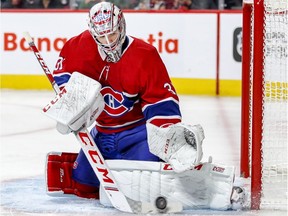 Montreal Canadiens' Carey Price makes a save during third period against the Toronto Maple Leafs in Montreal on Sept. 26, 2018.