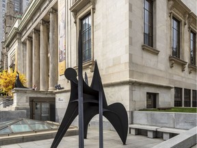 A replica of Alexander Calder's Trois Disques stands outside the Montreal Museum of Fine Arts as part of a retrospective on the sculptor.