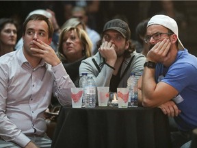 Parti Quebecois supporters watch the results of the Quebec election in Montreal Oct. 1, 2018.