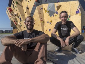 Nomad Bloc co-founders Babacar Daoust-Cisse and Frederik Coallier, right, in front of their portable climbing wall in Montreal, on Tuesday, October 9, 2018.