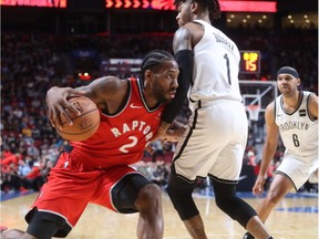 Raptors forward Kawhi Leonard drives to the basket during Wednesday night's pre-season game at the Bell centre.