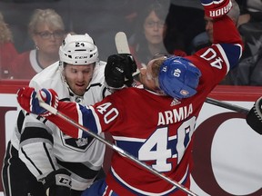 Canadiens' Joel Armia takes it on the chin from Kings' Derek Forbort Thursday night at the Bell Centre during Habs' 3-0 loss.