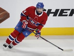 Veteran Canadiens centre Tomas Plekanec takes part in pre-game warmup before playing against the Detroit Red Wings in his 1,000th career NHL regular-season game at the Bell Centre in Montreal on Oct. 15, 2018.