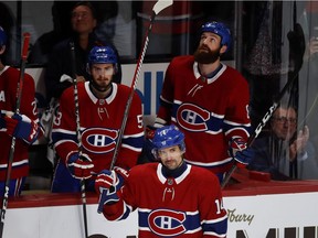 The Canadiens' Tomas Plekanec acknowledges cheering crowd as he plays his 1,000th NHL regular-season game against the Detroit Red Wings on Oct. 15, 2018 at the Bell Centre in Montreal. Plekanec scored a goal in the game, which the Canadiens won 7-3.