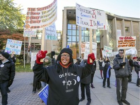 Westmount High School ethics, religion and culture teacher Sabrina Jafralie and colleagues protest the Coalition Avenir Québec government's plan to ban public employees from wearing religious symbols on the job.