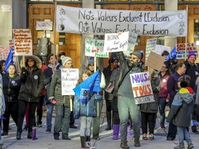 Westmount High School teachers protest against the Coalition Avenir Québec government's plan to bar certain public employees, including teachers, from wearing religious symbols on the job, in Montreal Thursday, Oct. 18, 2018.