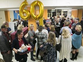 People line-up for a dinner at an all-class reunion held at Beaconsfield High School on Saturday.