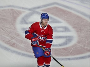 Canadiens defence man Karl Alzner skates across centre ice during warmup before NHL game against the Florida Panthers at the Bell Centre in Montreal on Oct. 24, 2017.