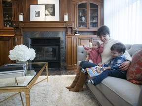 Amélie Dion with her daughter Eva and son James in the living room of their in Nuns' Island home.